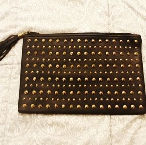 Gold studded clutch